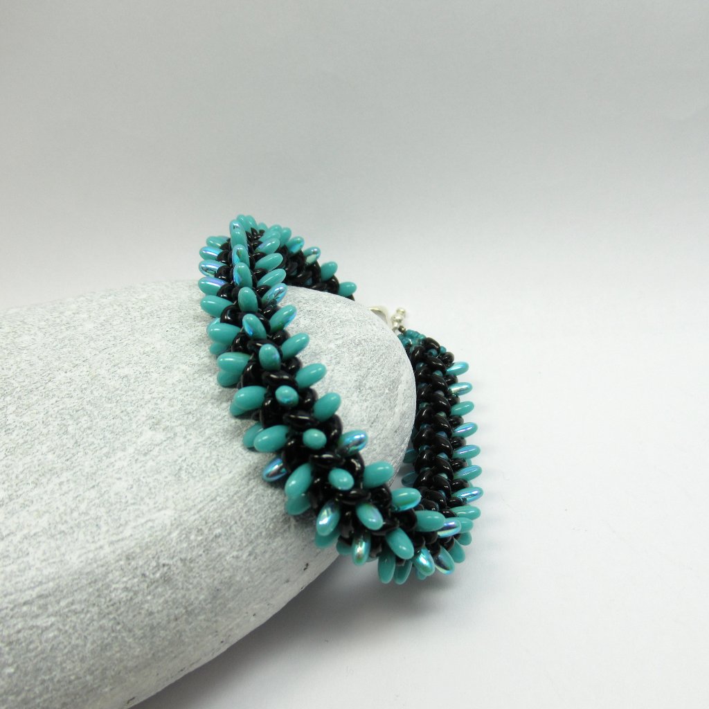 Handwoven Teal And Black Bracelet 50$